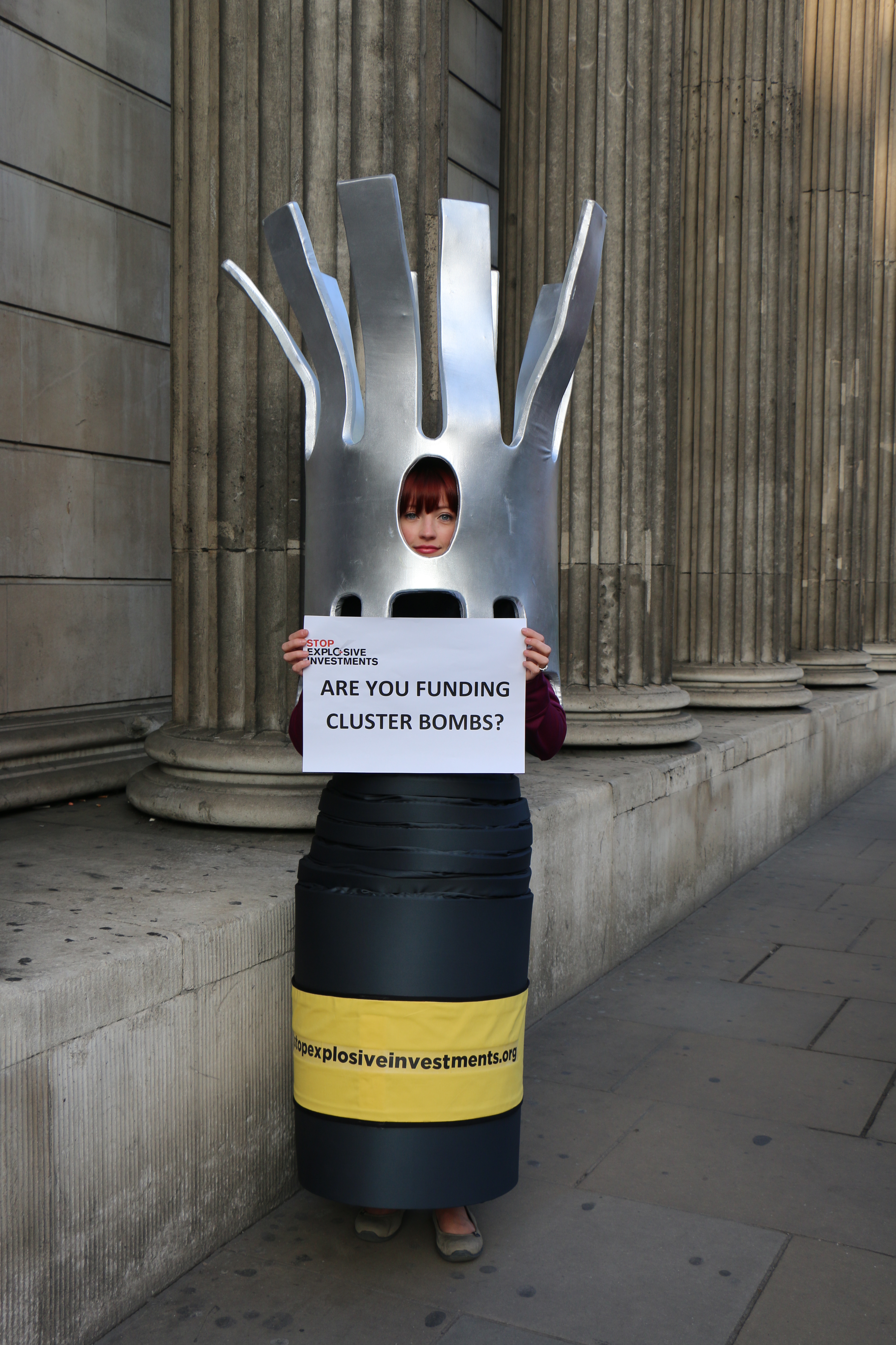Photo 2 - Campaigner dressed as a cluster bomb. Copyright Cluster Munition Coalition